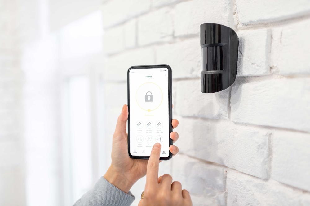 activation alarme par téléphone